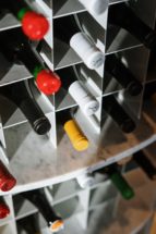 Wine and other bottled drinks are stored in containers.
